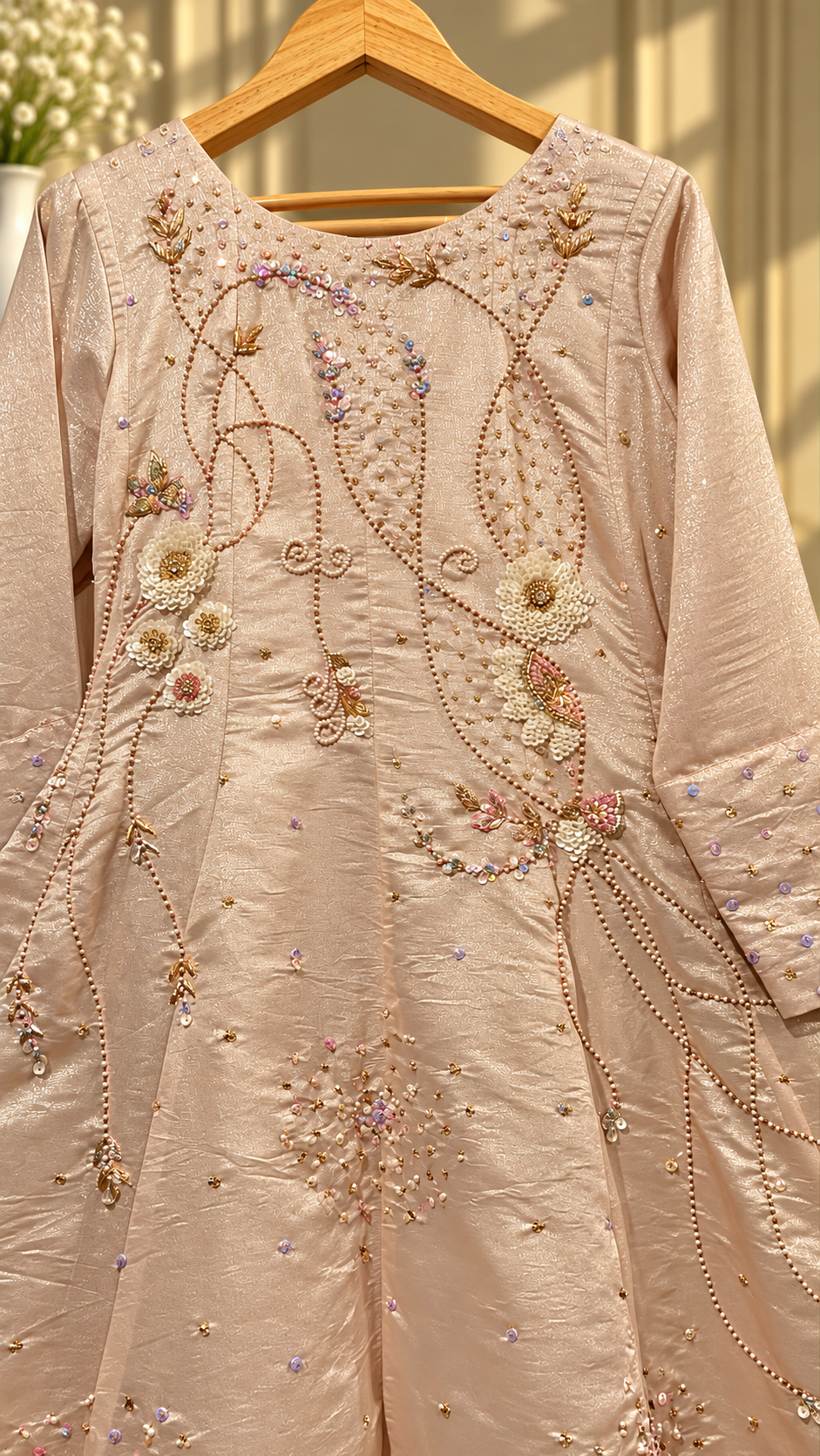 Blush peach formal Anarkali floral embroidery and bead detailing closeup