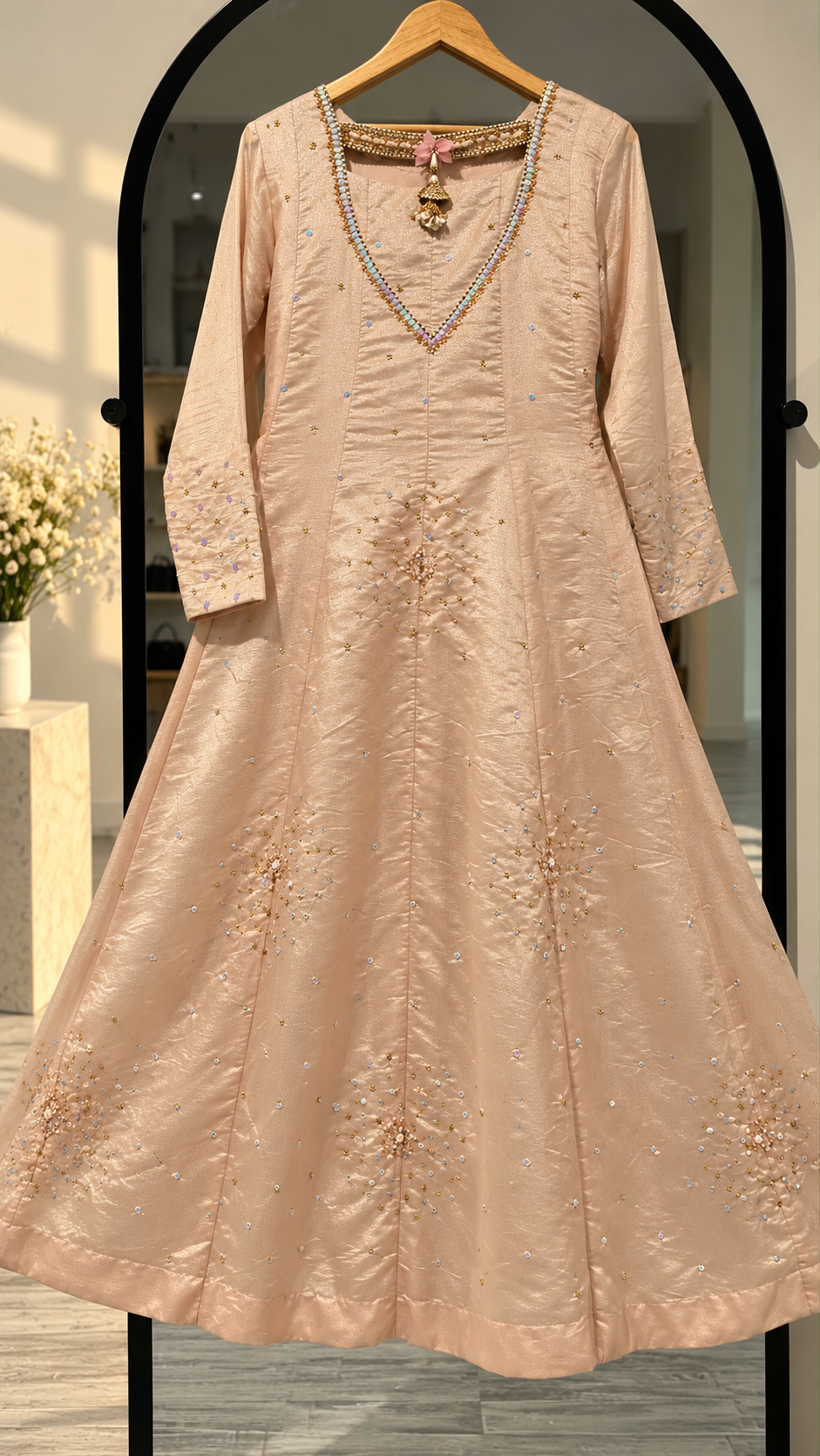 Blush peach flared Anarkali gown back view