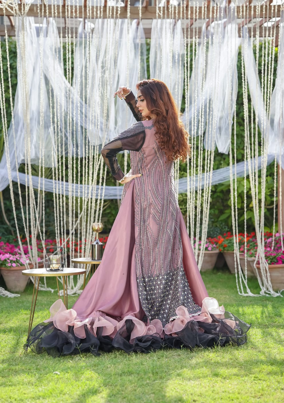 Dusty rose formal gown dramatic ruffle hem side back view